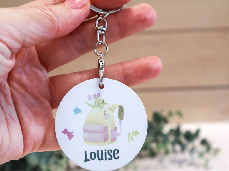Porte-clé rond personnalisé enfant avec prénom et illustration colorée