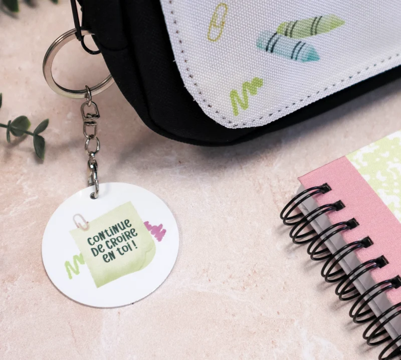 Grigri de sac personnalisé avec petit message encourageant au verso